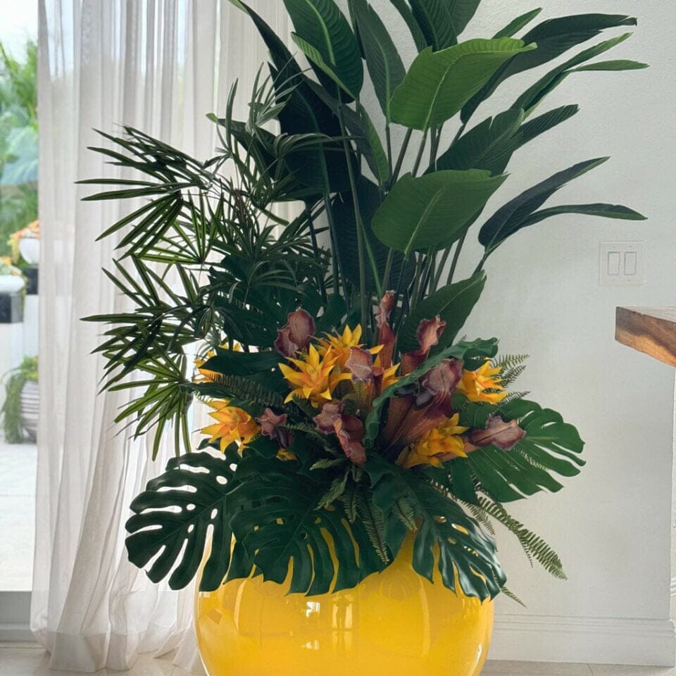 Mix of Tropical Plants in Yellow Globe Pot