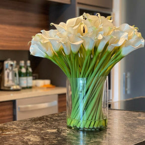 Calla Lilies in Glass Cylinder 10″