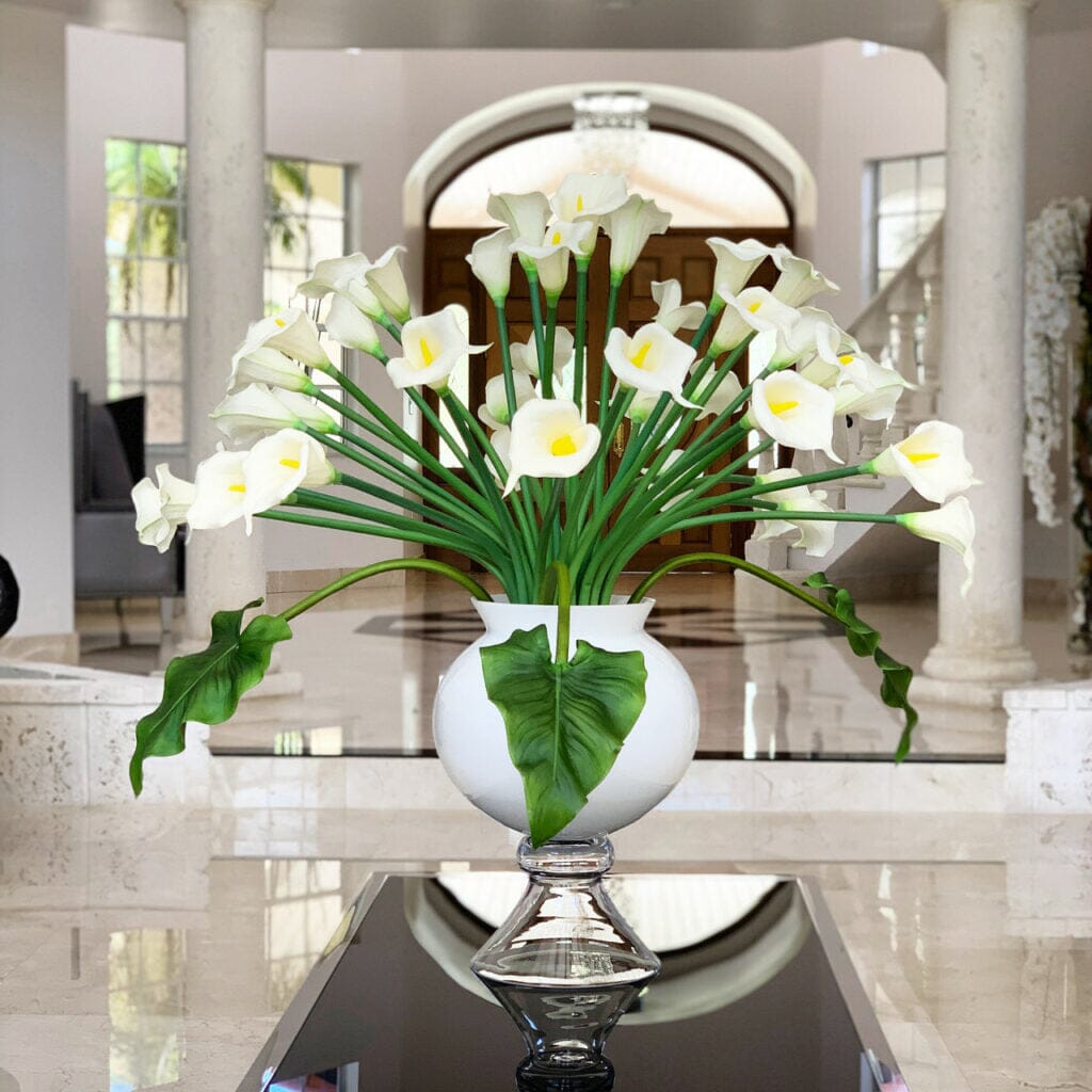 Elegant Vase with Multiple White Calla Lilies