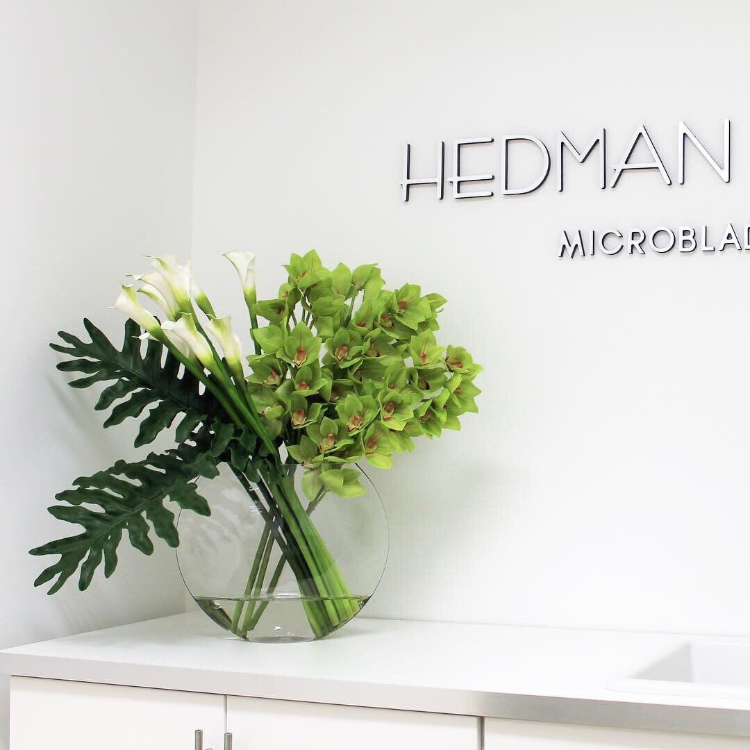 Lunar Vase with Green Cymbidiums and Callas