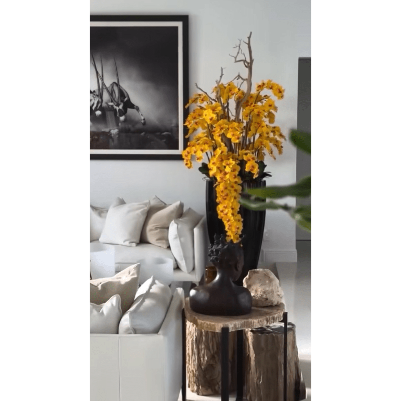 San Jose Vase in shiny black with hanging yellow orchids