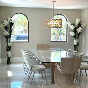White Vanda Orchids and Driftwood Inside a Large Conical Glass Cylinder